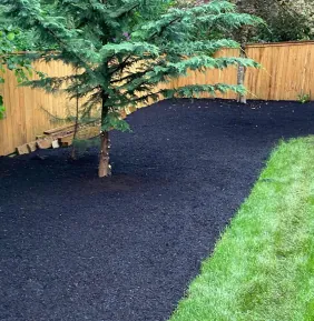 Bare bed to fresh bark, after